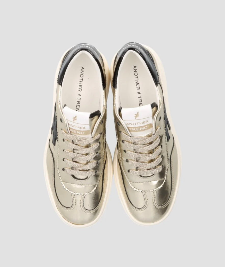 ANOTHER TREND gold platform sneakers