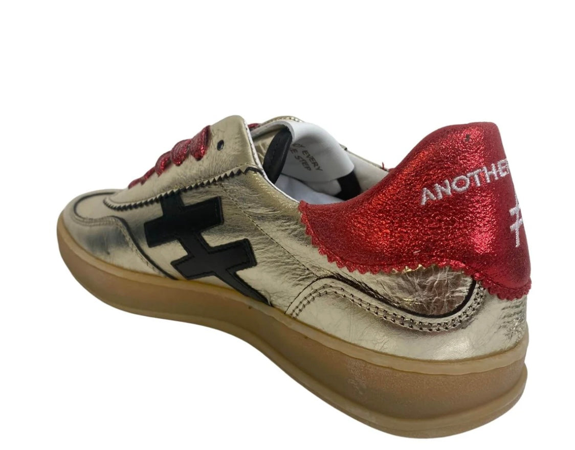 Another trend metallic gold and red leather sneakers