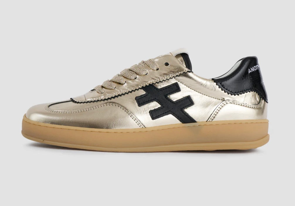 ANOTHER TREND gold and black sneakers