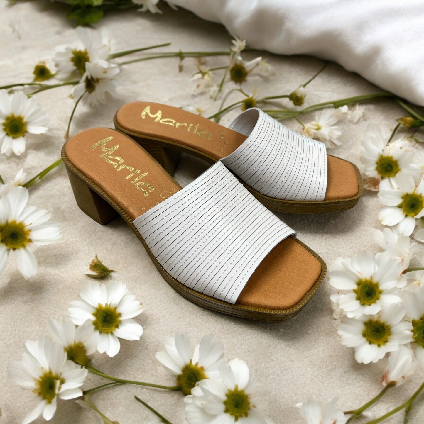 Marila white leather mules with stitch detail