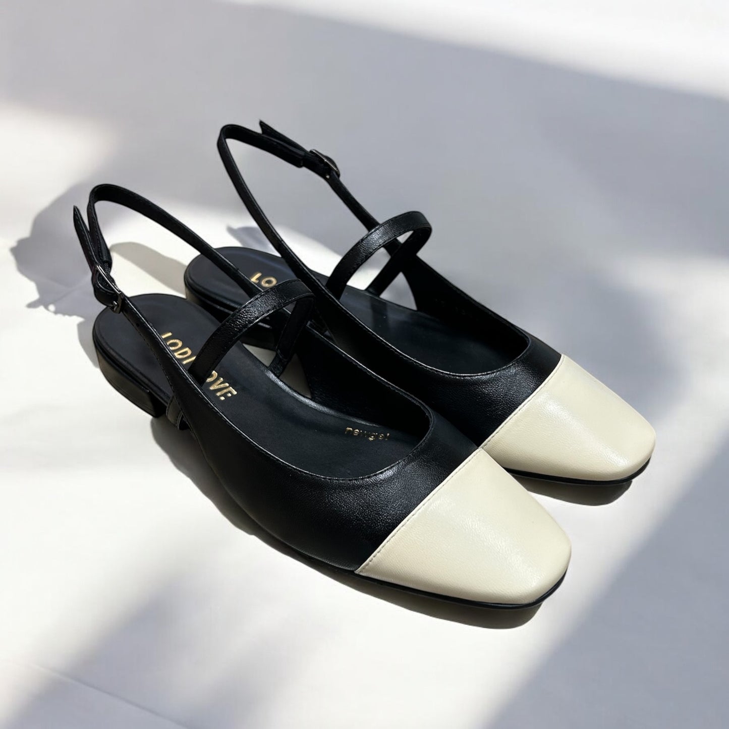 Lodi black and cream leather ballerina slingbacks